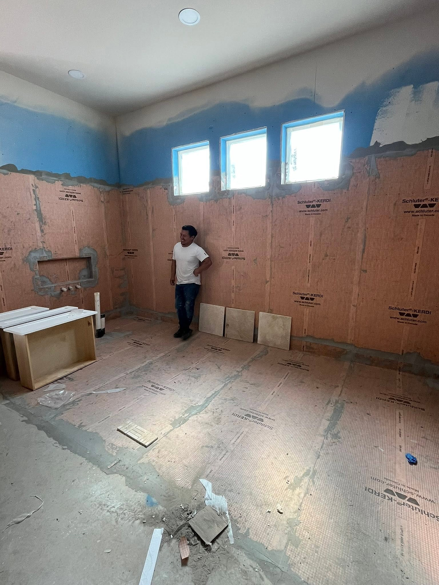 A primary bath waterproofed to the studs before tile